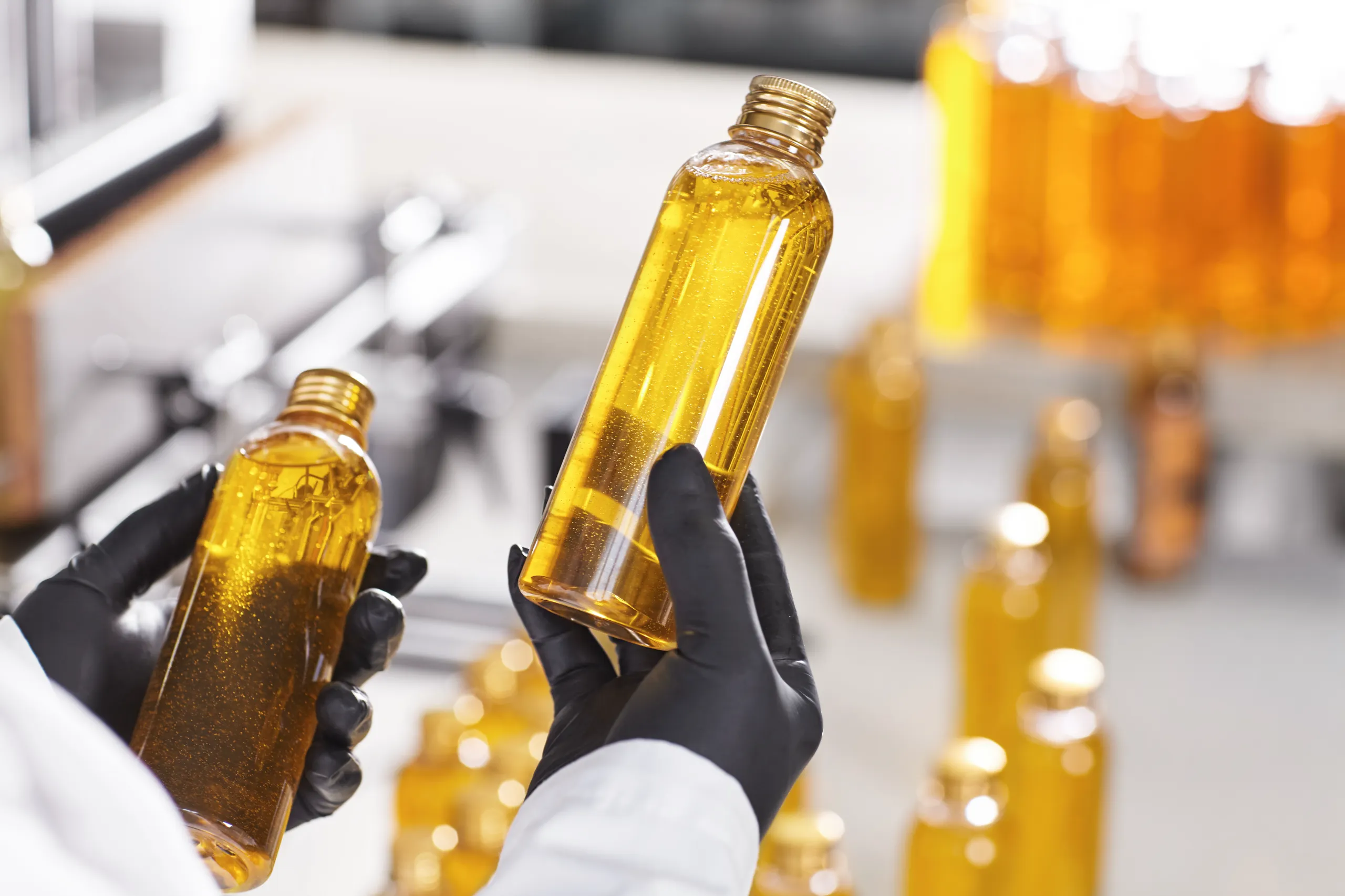 transparent-plastic-bottles-filled-with-yellow-substance (1)
