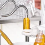 transparent-plastic-bottles-filled-with-yellow-substance (2)