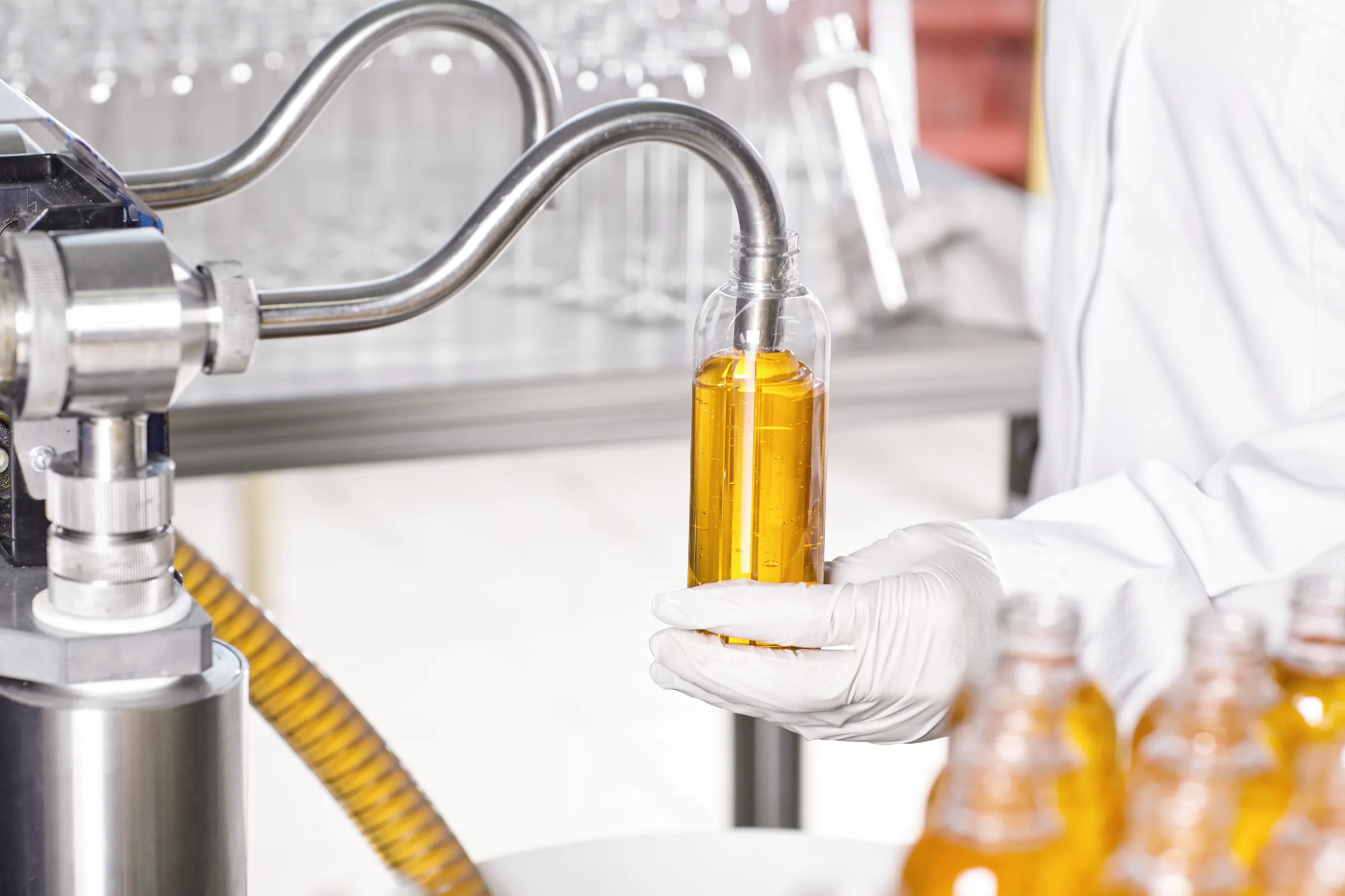 transparent-plastic-bottles-filled-with-yellow-substance (2)