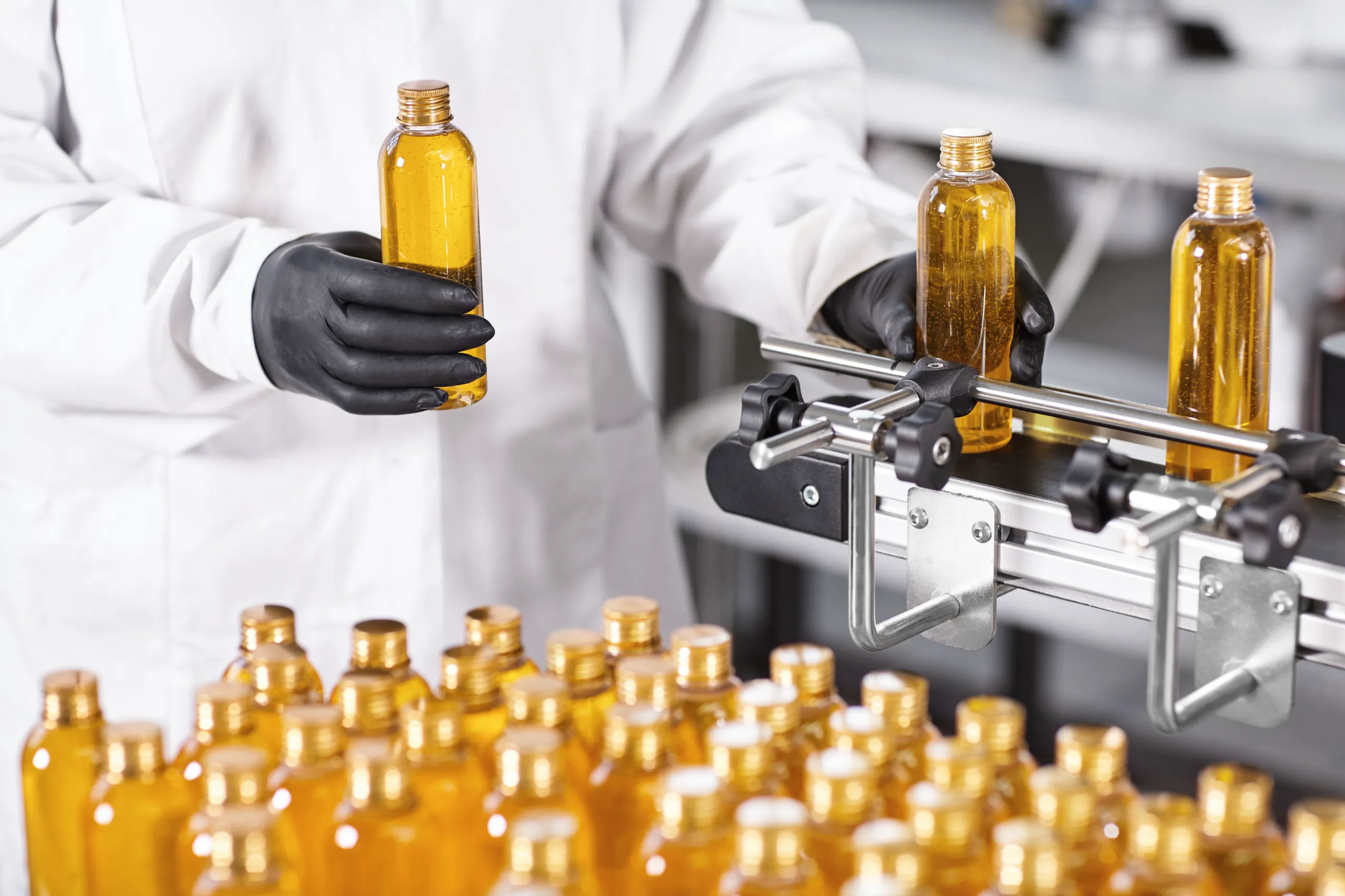 transparent-plastic-bottles-filled-with-yellow-substance